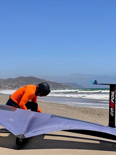 A kitesurf instructor getting ready