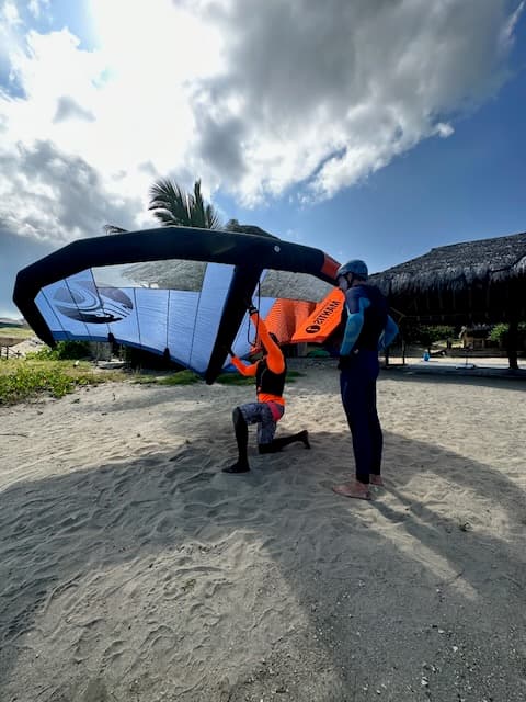 A kitesurf instructor teaching